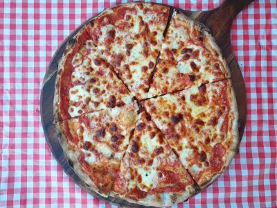 Delicious cheese pizza with golden crust and melted cheese.