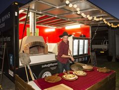 Vibrant pizza food truck serving fresh, delicious pizzas in Australia.