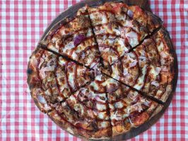 Delicious BBQ Chicken Pizza with Red Onion and Cheese.